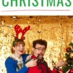 A couple in Christmas outfits with the text overlay how to survive your family Christmas