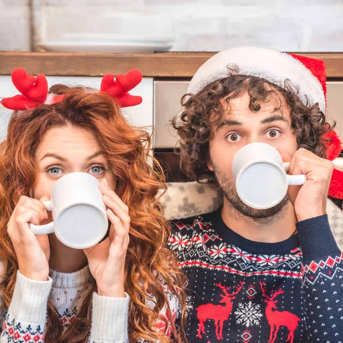 A couple drinking a cup of coffee together thinking on how to survive your family Christmas