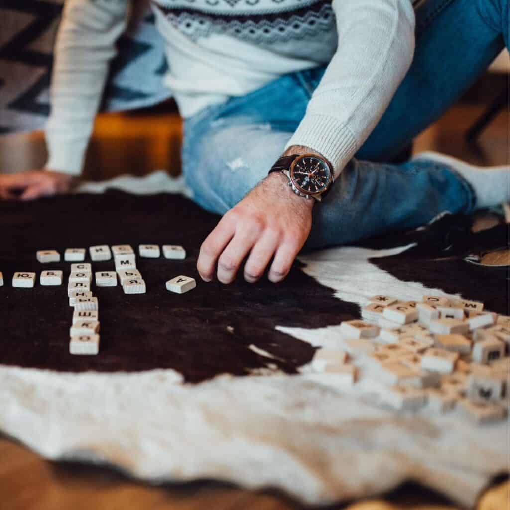 Playing scrabble as part of cheap winter date ideas