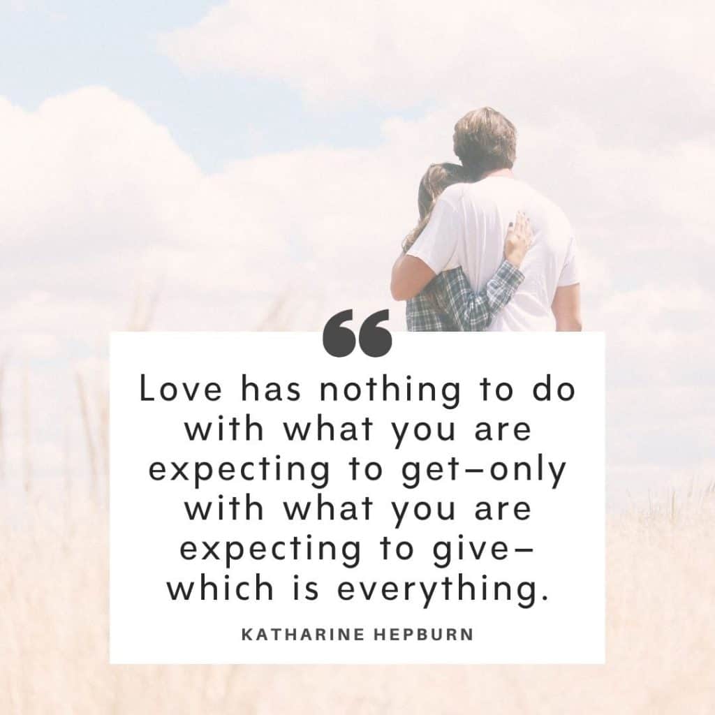 Text of one of the getting through hard times in marriage quotes by Katharine Hepburn The background image is of a  couple standing in a field with their backs to the camera and soft light all around.