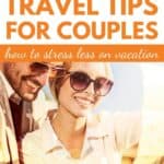 A couple bathed in sunshine looking at a map with the text overlay, Essential travel tips for couples.