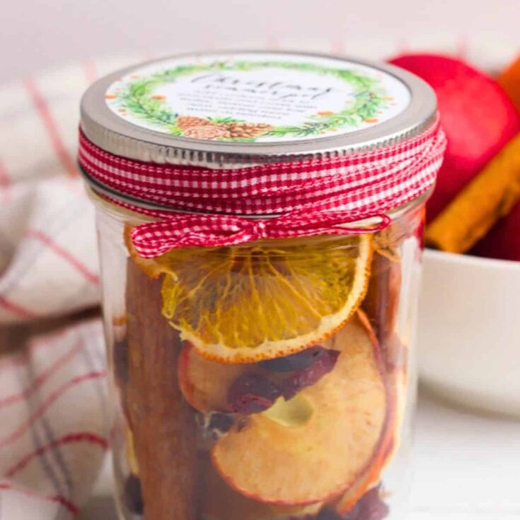 A jar of DIY stovetop potpourri Christmas simmer pot