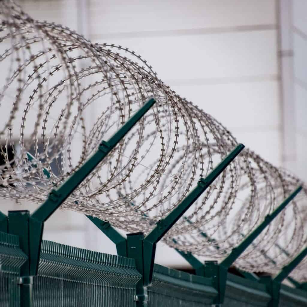 Wire at the top of a prison fence.