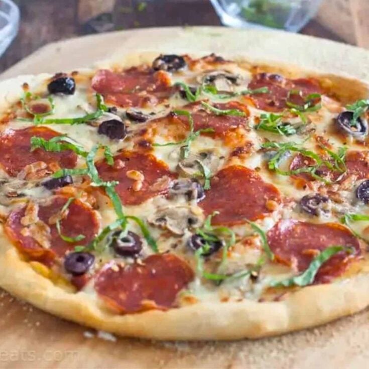 Pepperoni pizza made after reading these DIY pizza date night ideas