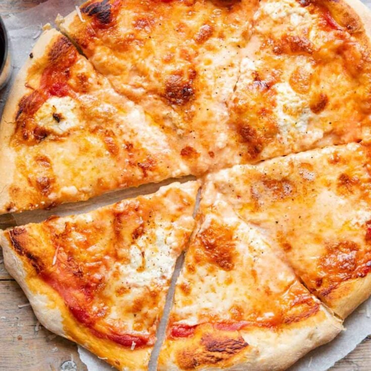 Quattro formaggi pizza made after reading these DIY pizza date night ideas