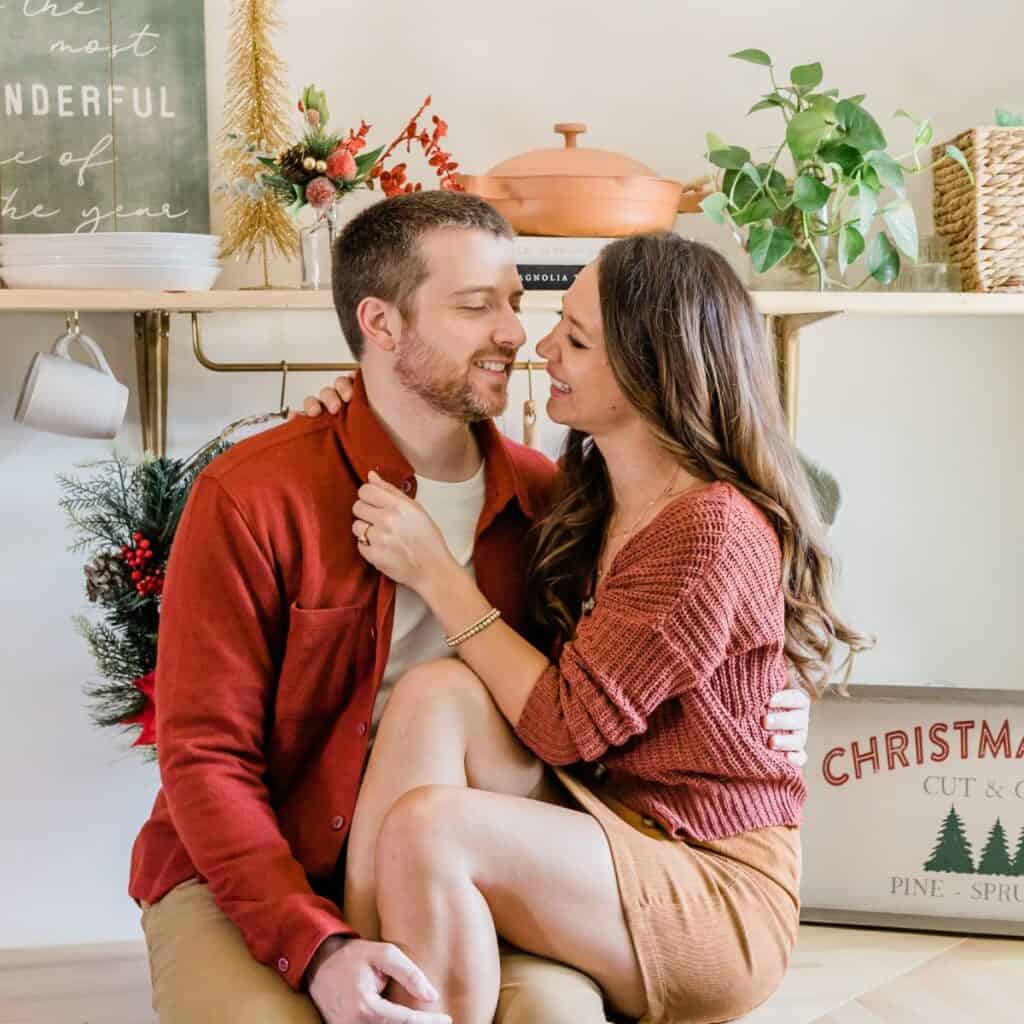 A couple asking each other Christmas questions after reading these Christmas date ideas