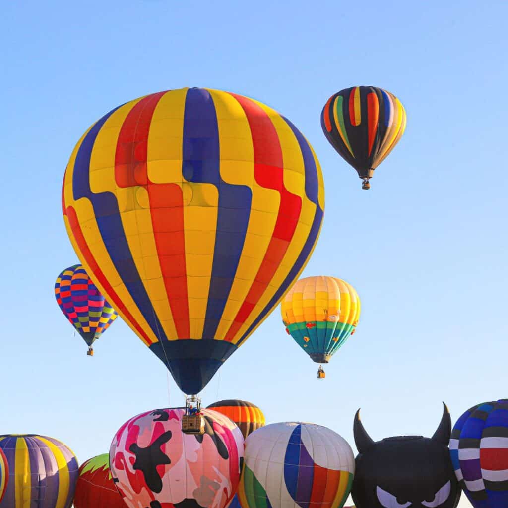 A hot air balloon in the sky at sunrise: one of the splurge Spring date ideas.