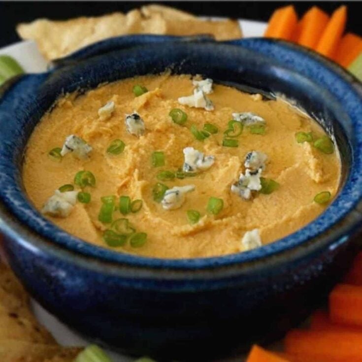 A bowl of Buffalo blue cheese hummus dip perfect as Super bowl appetizer