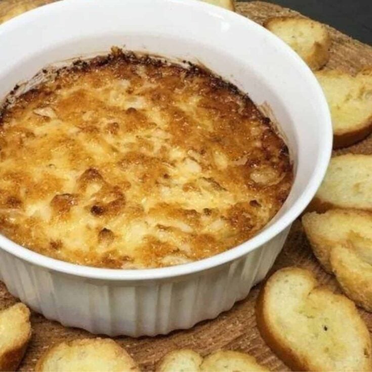 A bowl of cheesy baked Vidalia onion dip perfect as Super bowl appetizer