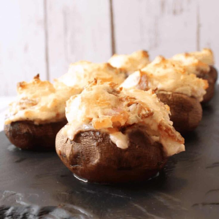 Cheese and bacon stuffed mushrooms perfect as Super bowl appetizer