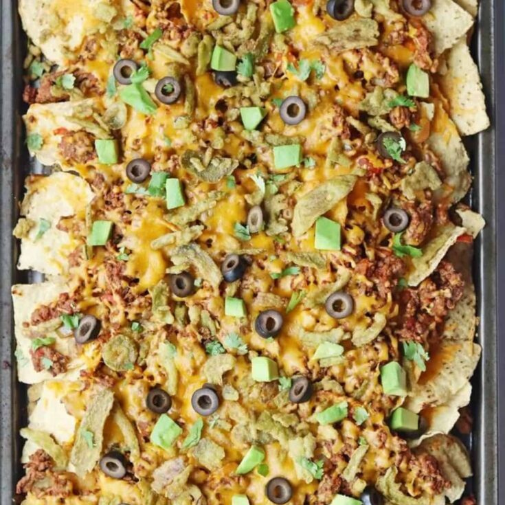A tray of crispy jalape&ntilde;o loaded nachos perfect as Super bowl appetizer