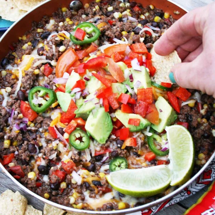 A bowl of Mexican ground beef skillet perfect as Super bowl appetizer