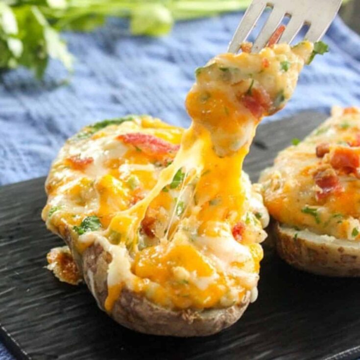 A delicious loaded twice baked potatoes perfect as Super bowl appetizer