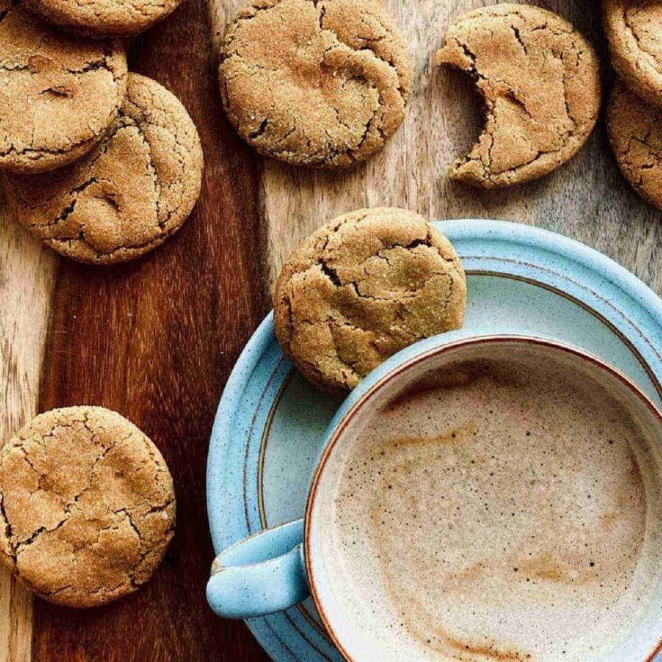 Gingerbread cookies with a cup of coffee perfect to serve as Christmas cookies
