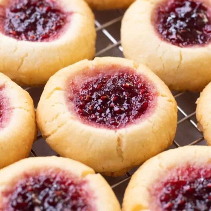 A tray of raspberry thumbprint cookies perfect to serve as Christmas cookies