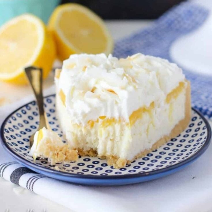 A slice of no-bake lemon and coconut macaroon cheesecake served on the table