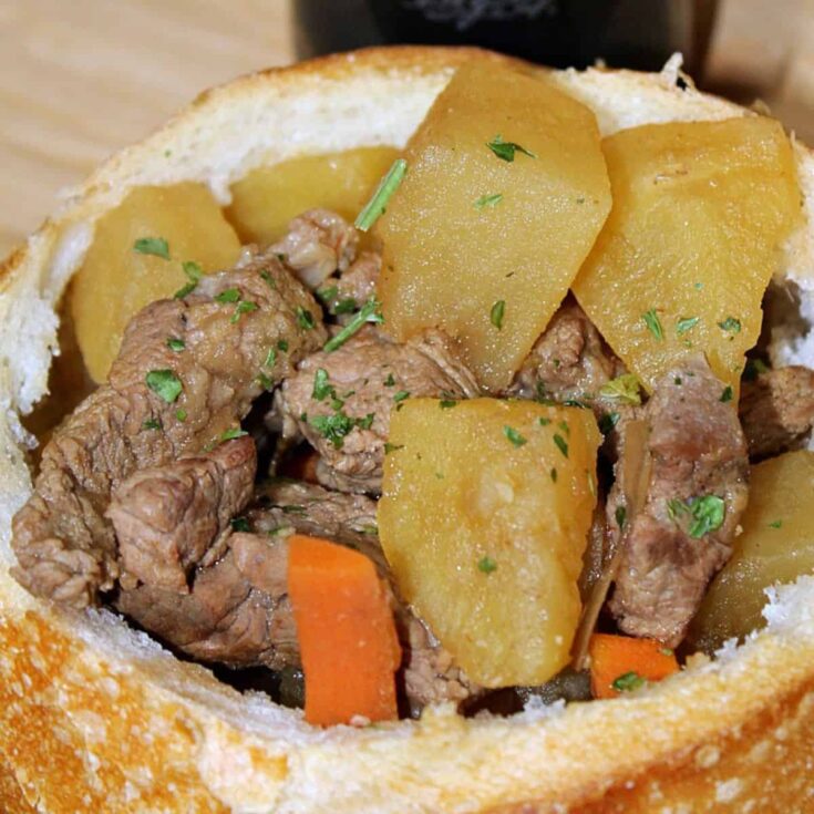 A slow cooker Guinness beef stew served on the table