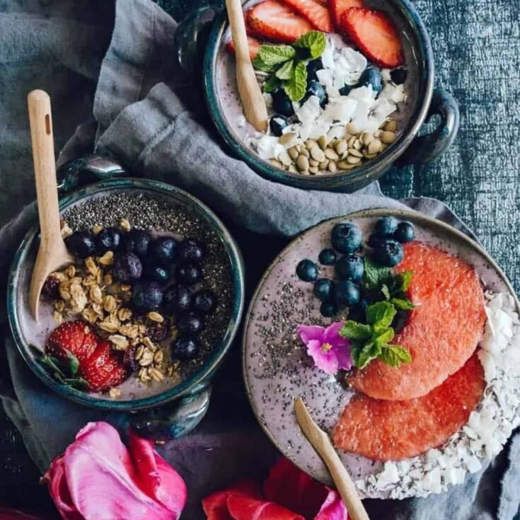 Three appetizing blueberry banana smoothie bowl perfect as 4th of July breakfast idea