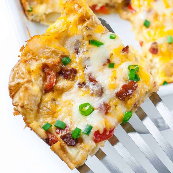 A slice of delicious cheesy roasted potato
