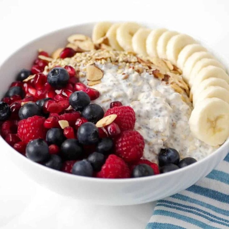 A bowl of vanilla overnight oats with fruit perfect for 4th of July breakfast ideas