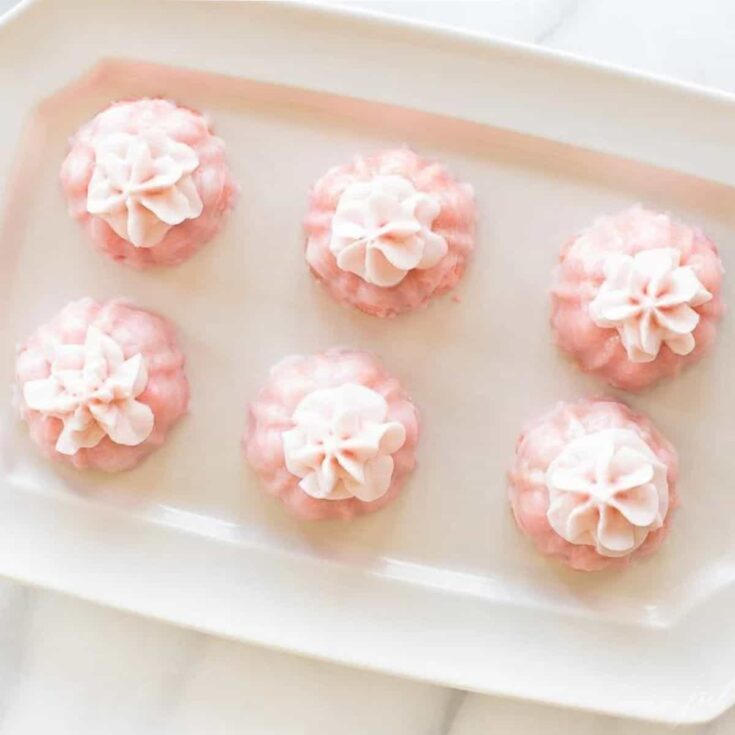 A tray of pink champagne cupcakes Valentines Day cupcakes