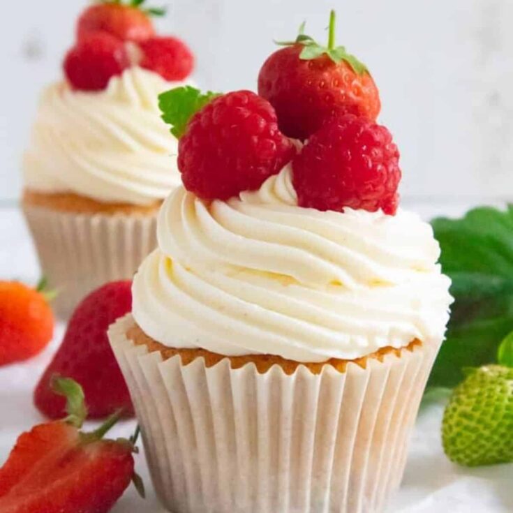 An appetizing strawberries and cream Valentines Day cupcakes