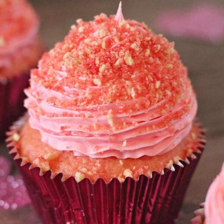 An appetizing strawberry crunch Valentines Day cupcake