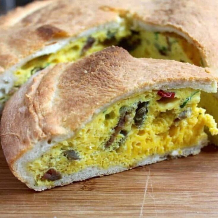 A slice of traditional Italian Easter pie with eggs
