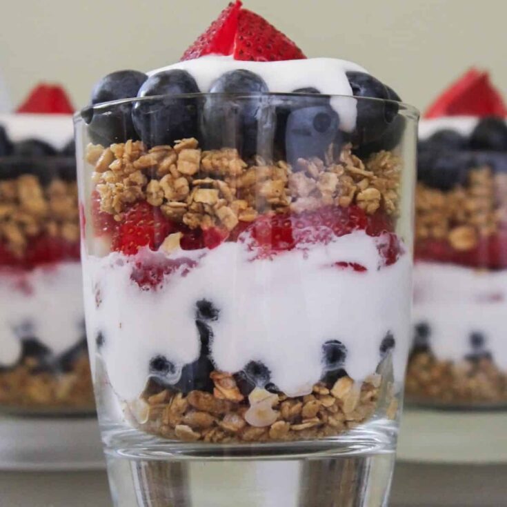 A glass of vegan berry parfaits perfect for 4th of July breakfast ideas
