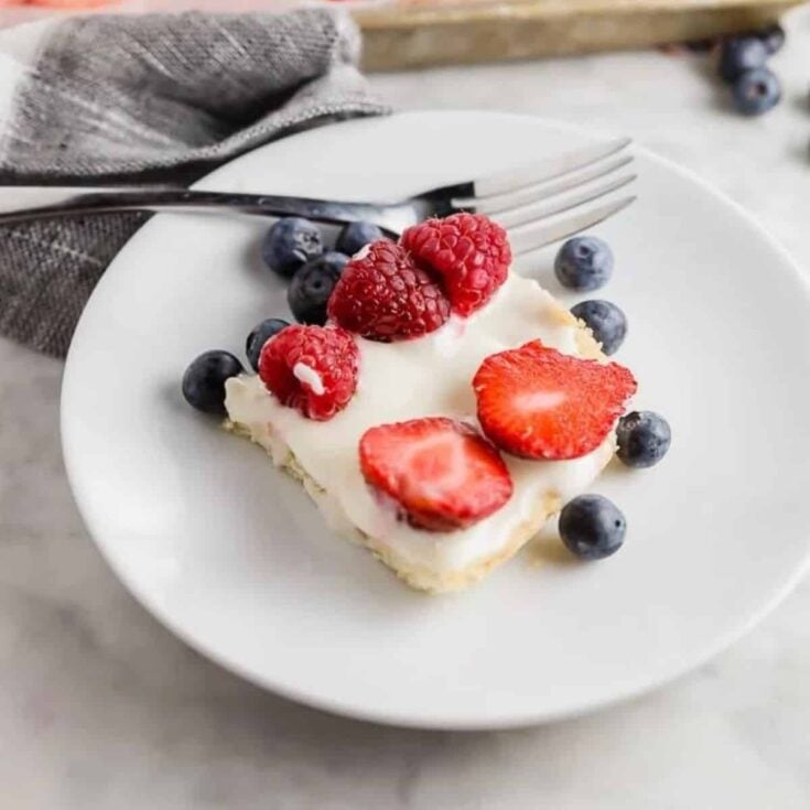A plate of Gluten free American flag cookie cake perfect as Patriotic Cookies