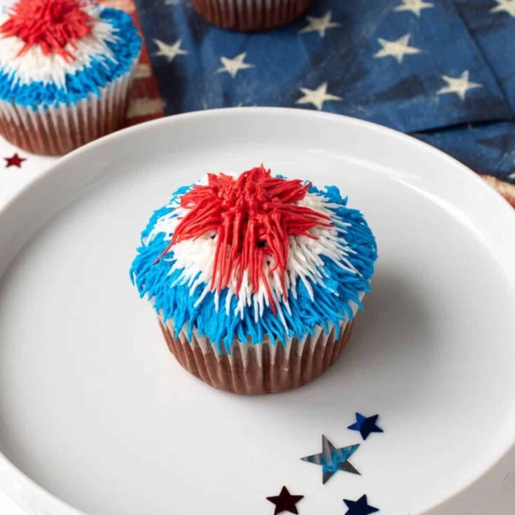 A plate of red velvet firework Patriotic Cupcakes