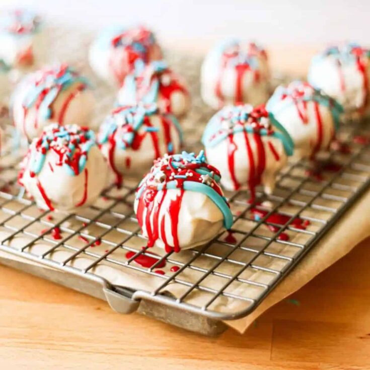 A tray of red, white and blue patriotic cake balls