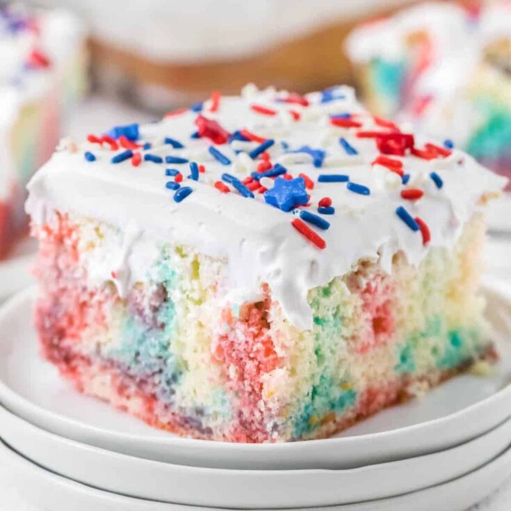 A slice of appetizing red, white, and blue patriotic poke cake