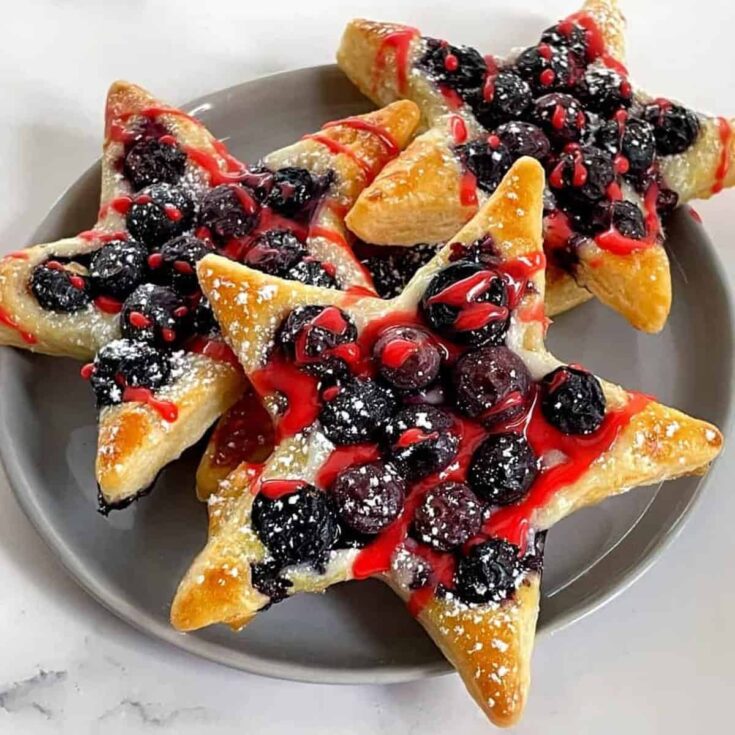 A plate of an appetizing blueberry puff pastry stars Patriotic Dessert