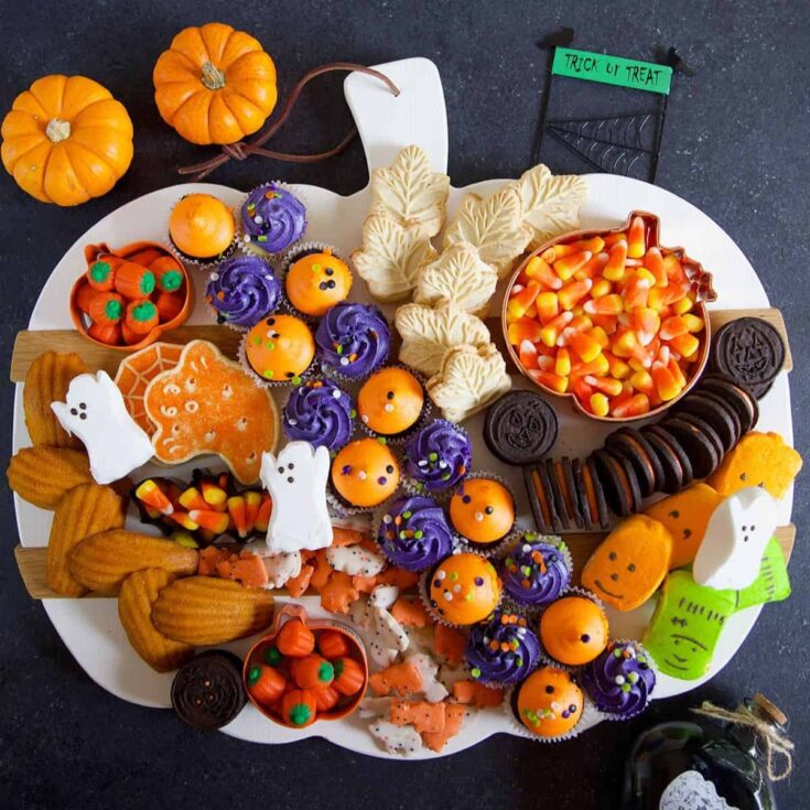 A colorful Halloween charcuterie dessert board