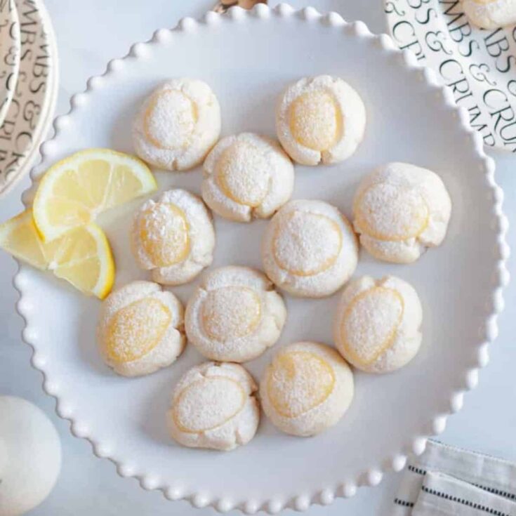 A plate of lemon drop cookies perfect for an English afternoon tea party
