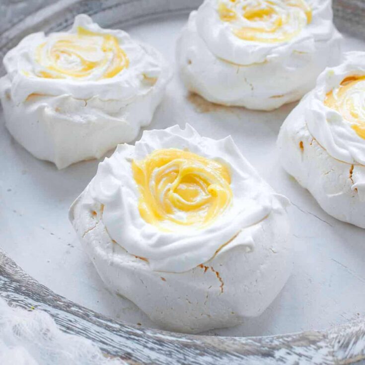 Mini pavlovas with tangerine curd perfect for an English afternoon tea party