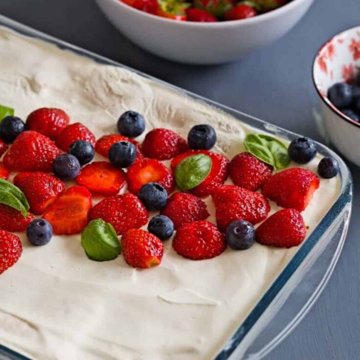 A tray of a no bake berry ice box cake Patriotic Dessert