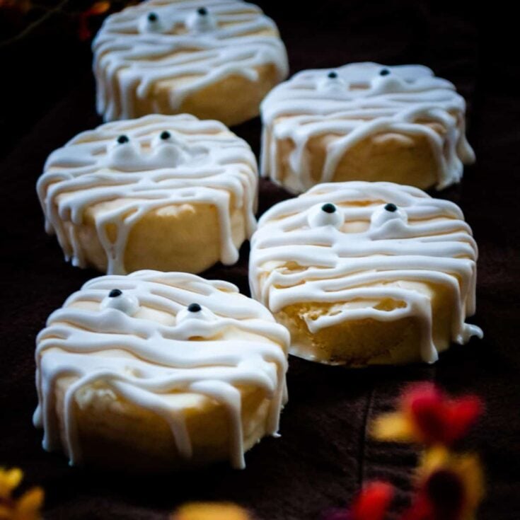 A set of Halloween No bake mummy cookies filled with white icing
