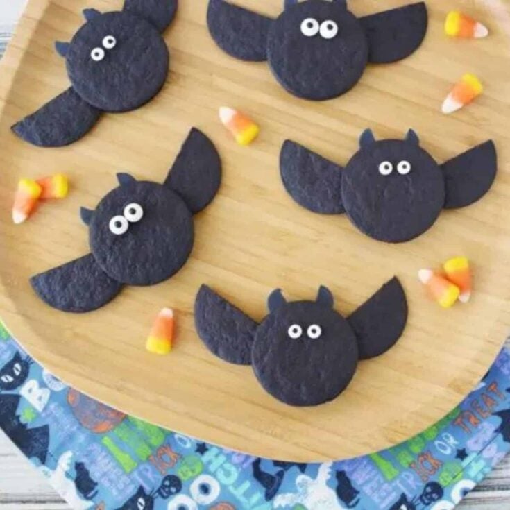 A plate of cute Halloween no bake bat-shaped cookies