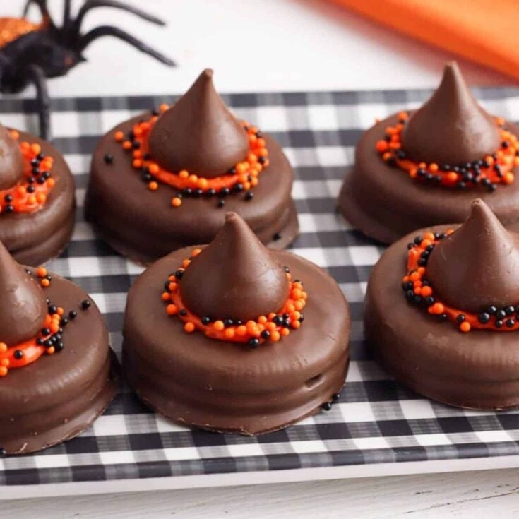 A tray of witch hat Halloween cookies