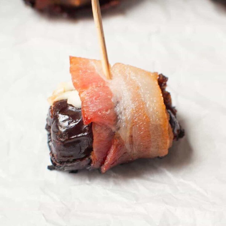 Bacon wrapped dates with cream cheese cooked after reading these Fall appetizers recipe