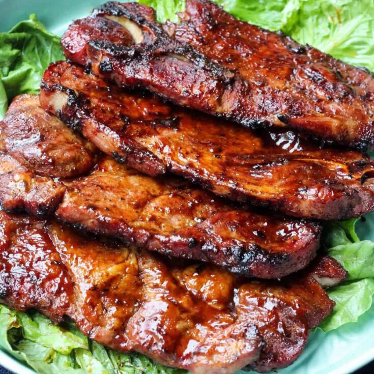 Barbecued pork steaks cooked after reading these Summer grilling recipes