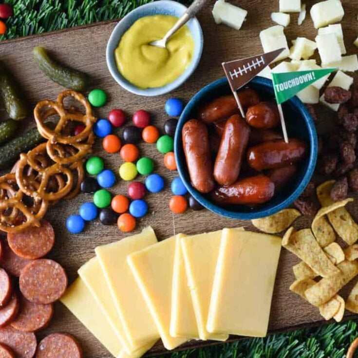 Football charcuterie board prepared after reading these Tailgating recipes