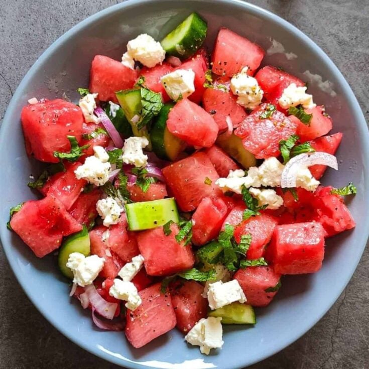A bowl of Greek watermelon feta, prepared after reading these summer salad recipes