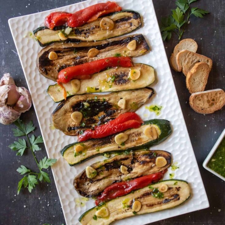 Grilled zucchini eggplants and peppers salad cooked after reading these Summer grilling recipes