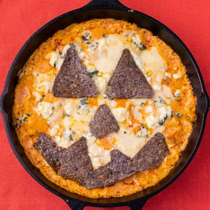A bowl of Halloween buffalo chicken dip cooked after reading these Halloween starters