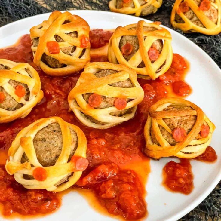 Appetizing Halloween mummy meatballs cooked after reading these Halloween starters