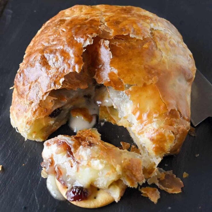 Holiday baked brie cooked after reading these Thanksgiving appetizers