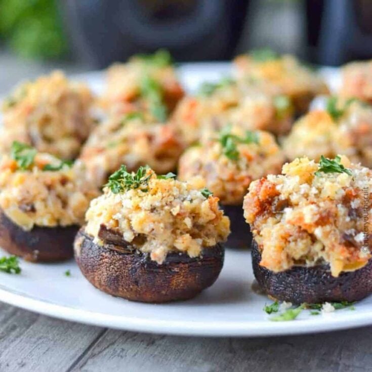 An appetizing set of Italian sausage stuffed mushrooms cooked after reading these Thanksgiving appetizers